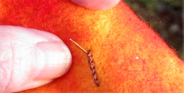 embroider leaf veins onto felted autumn leaves wool blanket recycled